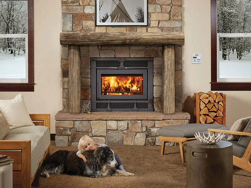 Travis wood fireplace burning in a Montana living room